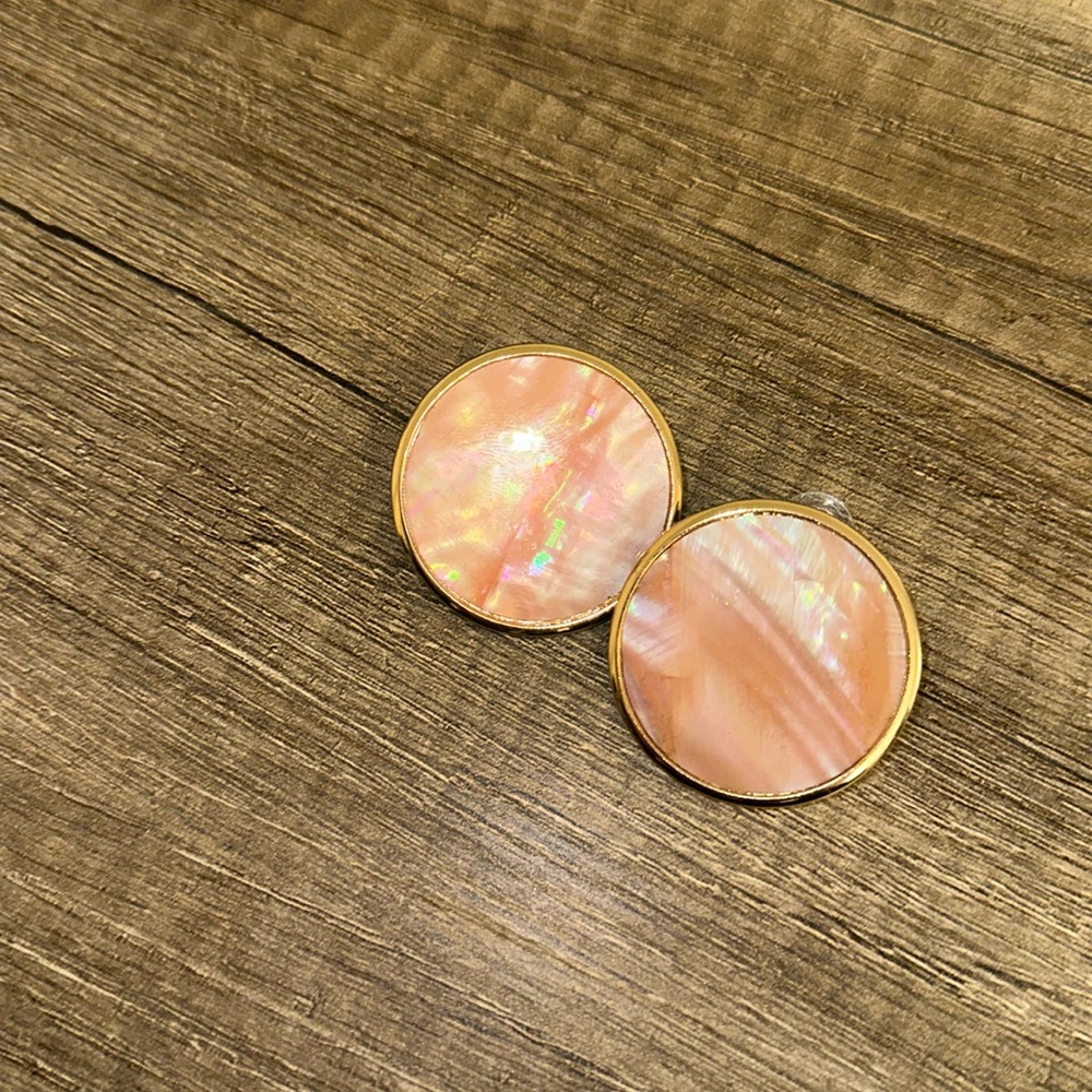 Gold rimmed pink stud earrings